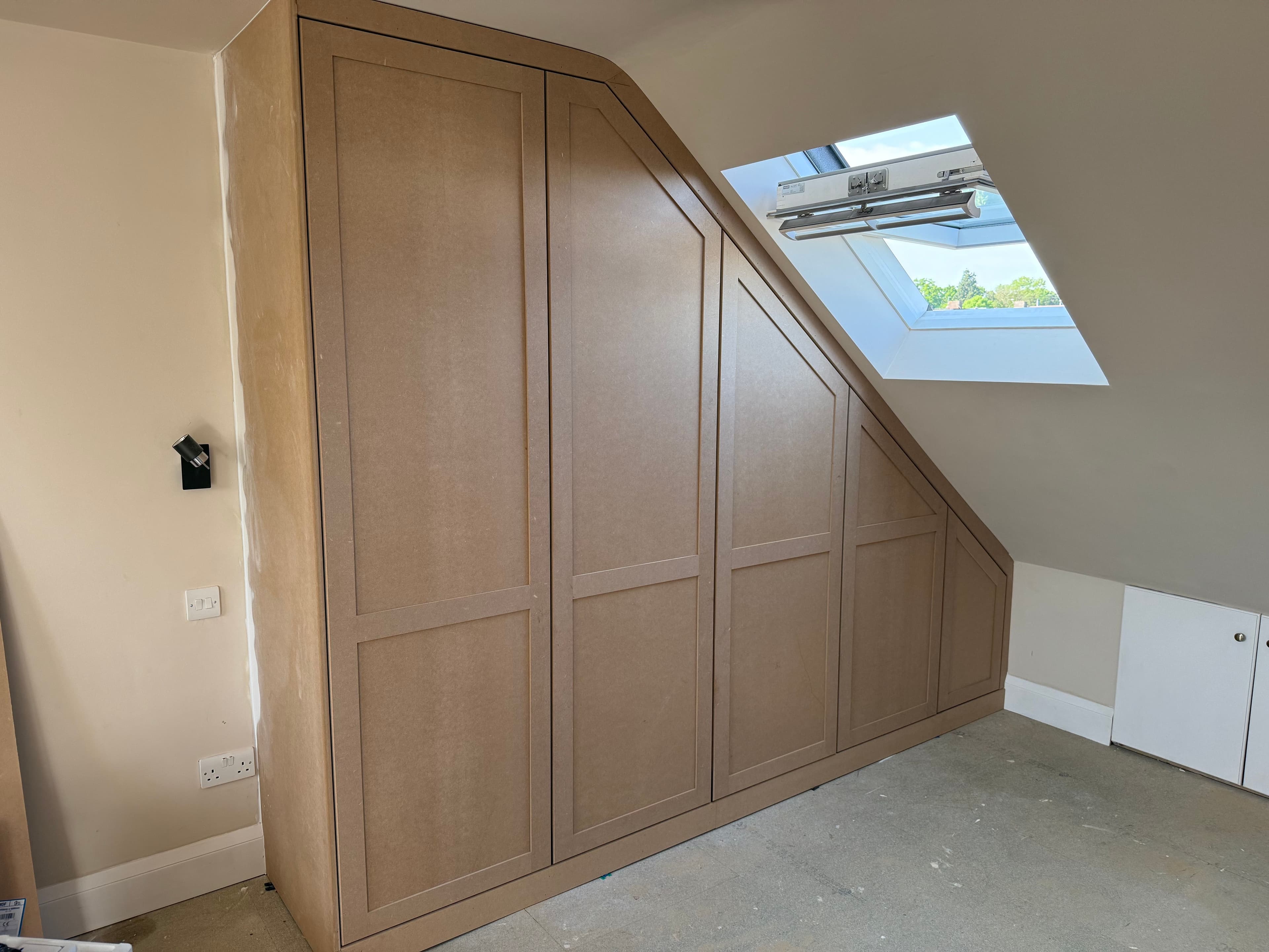 Bespoke Wardrobes (Long Ditton) by Devlin Carpentry in London & Surrey - Bespoke wardrobe installation featuring floor-to-ceiling storage and precision-fitted cabinetry.